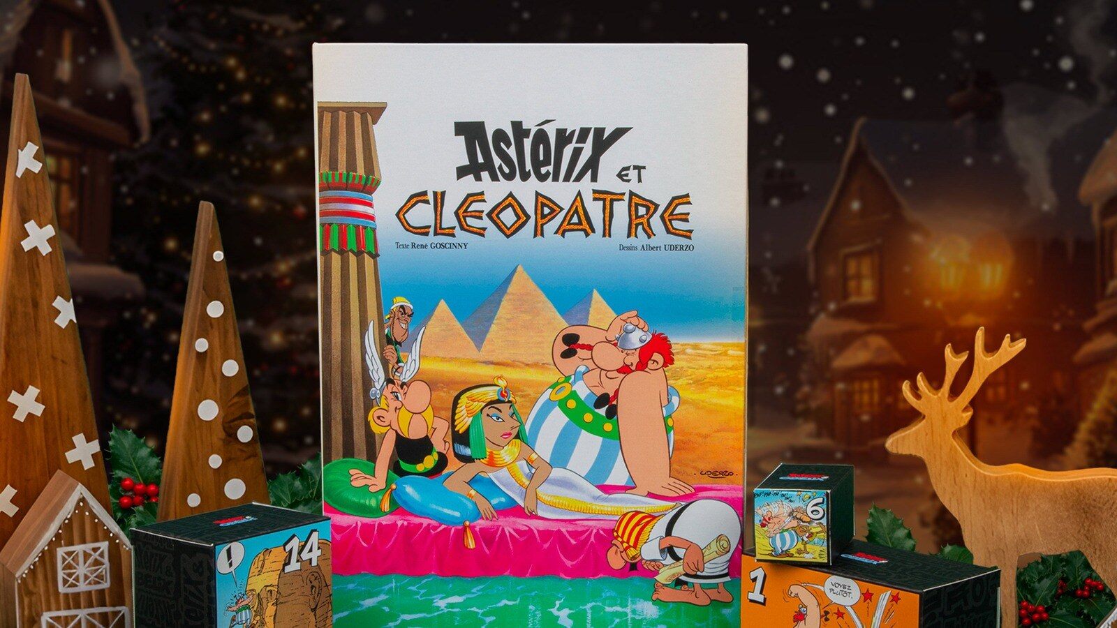 Le calendrier de l’Avent Astérix et Cléopâtre façon album de BD, entouré de petites boîtes numérotées dans un décor de Noël enneigé