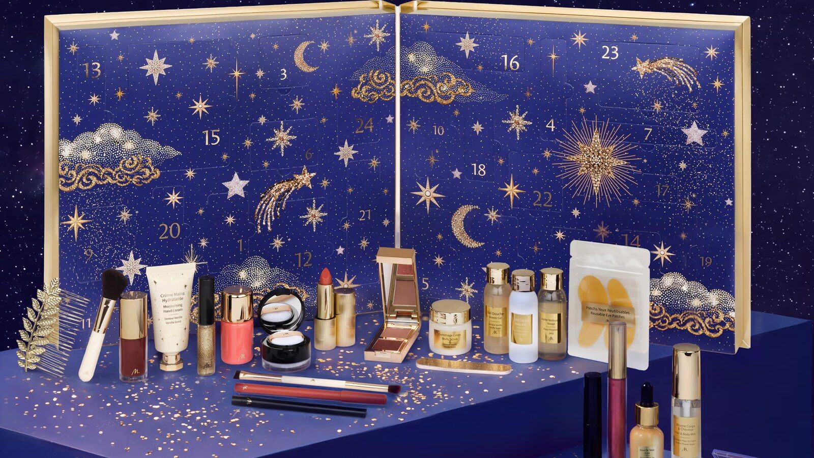 Le calendrier de l’Avent Marionnaud 2026 ouvert, bleu nuit étoilé, avec ses produits de maquillage et de soin disposés devant