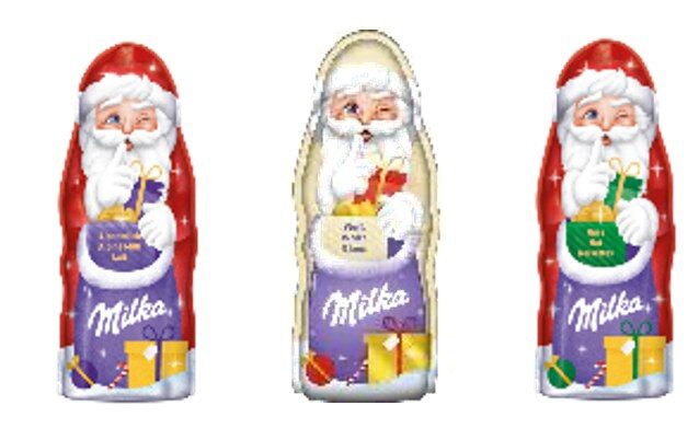 Trois Pères Noël en chocolat Milka, en version chocolat au lait, chocolat blanc et chocolat au lait aux noisettes