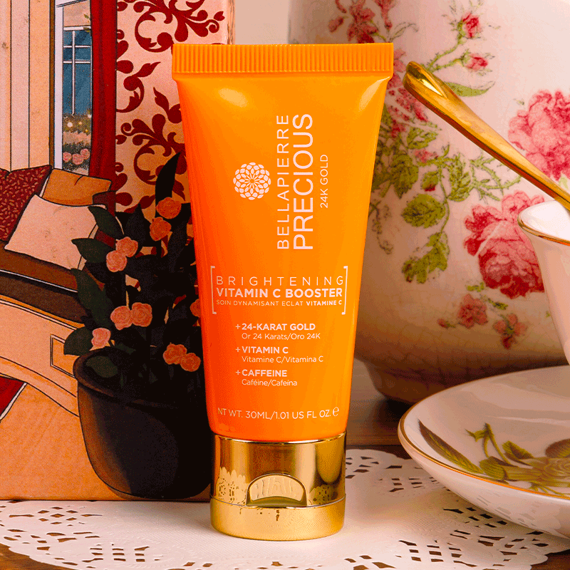 Le tube orange Bellapierre Precious Booster Éclat Vitamine C de la sélection Glowria.
